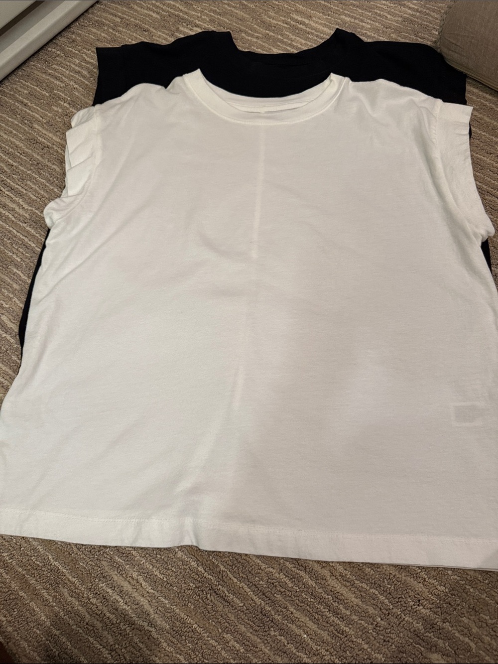 A New Day muscle tees